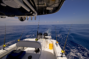 deep sea trolling on a center console boat. 